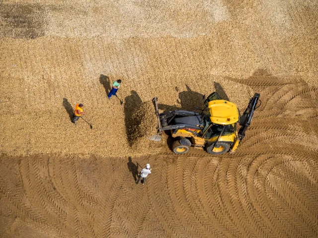 Excavation crew using heavy equipment to prepare land for a new Texas highway project.
